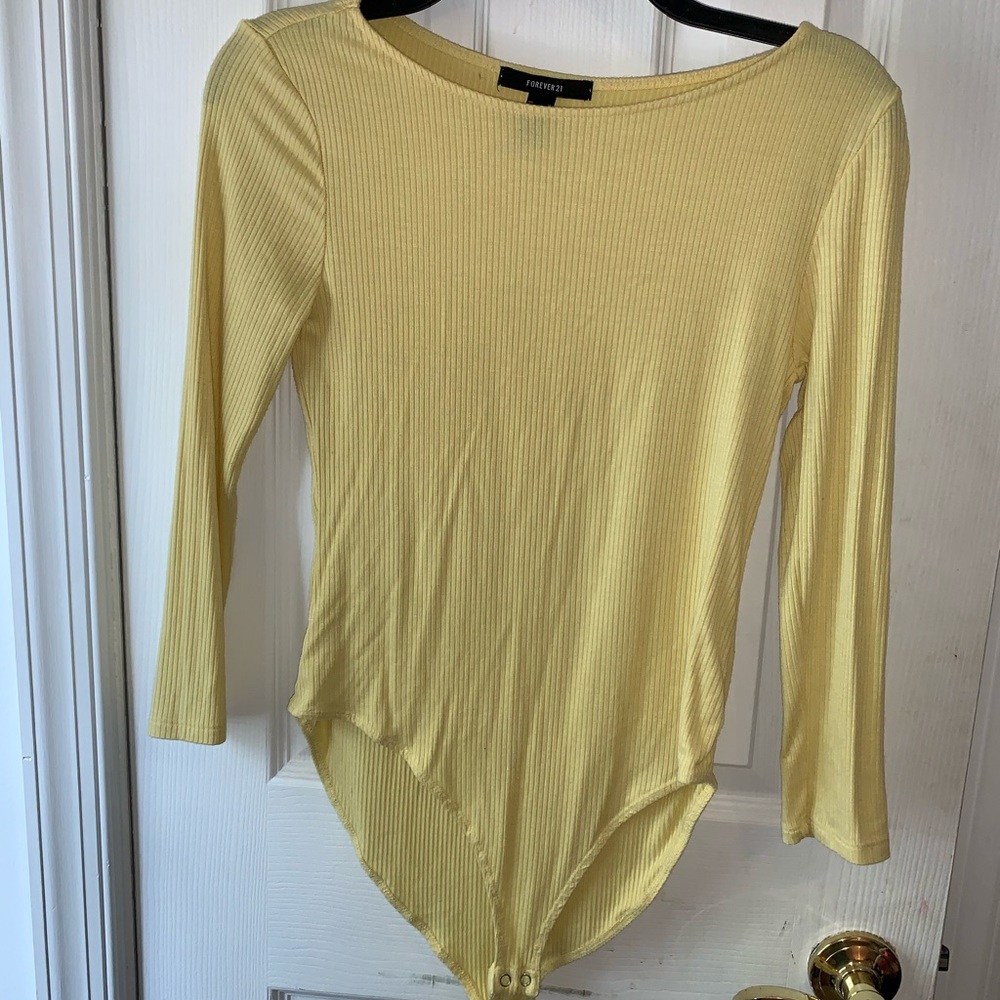 Baby yellow body suit